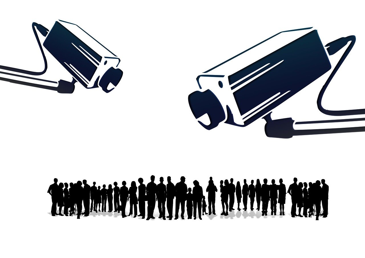 Drawing of a crowd being watched by surveillance cameras.